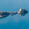 photo: Aerial Account - An aerial view of Chateau Ruphy, a French castle, as seen from Col de la Forclaz, a mountain pass near Annecy, France.